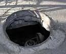 В Кривом Роге в канализационном колодце найден труп женщины, завернутый в целлофановый в пакет